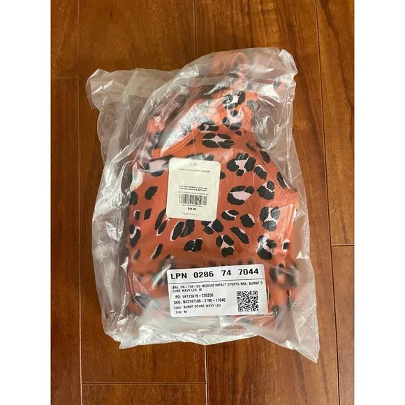New Fabletics On The Go Bra Med Impact Sports Bra Burnt Ochre Wavy Leo Size M